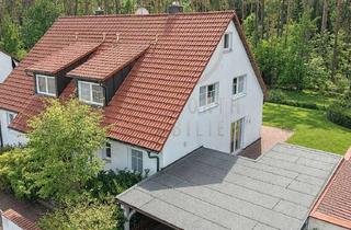 Doppelhaushälfte kaufen in 90592 Schwarzenbruck, Naturnah investieren – vermietete Doppelhaushälfte mit Garten