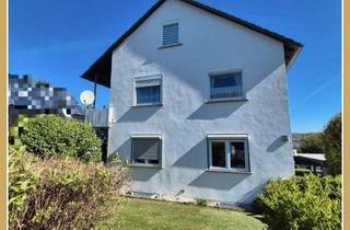 Haus kaufen in 34260 Kaufungen, Sofort bezugsfrei: Zweifamilienhaus mit Dachstudio, Doppelgarage und Carport