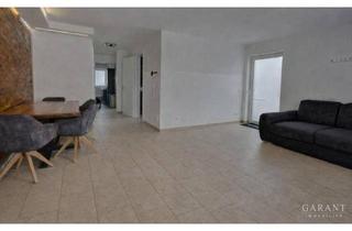 Wohnung kaufen in 85055 Ingolstadt, Neuwertige Erdgeschosswohnung mit großem Garten, Terrasse und hochwertiger Ausstattung