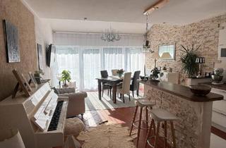Wohnung kaufen in 61381 Friedrichsdorf, Friedrichsdorf - Haus-im-Haus-Gefühl: Exklusive Split-Level-Wohnung