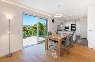 Wohnung kaufen in 97204 Höchberg, Höchberg - Exklusive 4-Zimmer-Wohnung mit großzügiger Terrasse in hochwertiger Ausstattung
