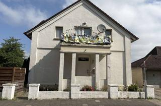 Haus kaufen in Permer Straße 41, 49479 Ibbenbüren, Charmantes Zweifamilienhaus mit Potenzial in Ibbenbüren-Laggenbeck zu verkaufen!
