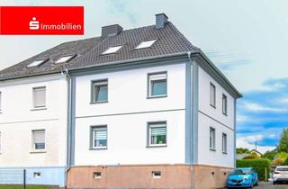 Doppelhaushälfte kaufen in 65589 Hadamar, Charmante Doppelhaushälfte mit Terrassen, großem Garten und Ausbaupotenzial in Hadamar-Oberzeuzheim