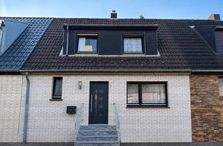 Reihenhaus kaufen in 52134 Herzogenrath, Gemütliches Reihenhaus mit Garten, überdachter Terrasse und übergroßer Garage!