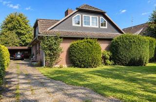 Einfamilienhaus kaufen in 21357 Wittorf, Einfamilienhaus im Bungalowstil mit ausgebautem Dachgeschoss und großem Grundstück