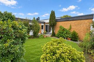 Haus kaufen in 42799 Leichlingen, Ebenerdiger Atriumbungalow mit privater Gartenidylle und Einzelgarage