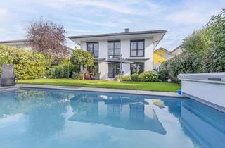 Villa kaufen in 53757 Sankt Augustin, Exklusive Stadtvilla mit beheiztem Pool – stilvolles Familienleben in ruhiger Bestlage.
