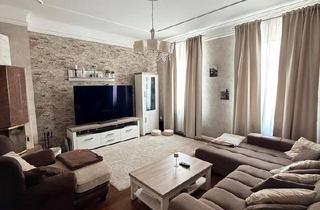 Wohnung kaufen in 31789 Hameln, Hameln - Charmante 3-Zimmer-Altbauwohnung mit Kamin und Balkon