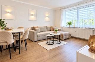 Wohnung kaufen in 25337 Kölln-Reisiek, Kölln-Reisiek - Moderne 3-Zimmer-Wohnung mit Balkon und Blick ins Grüne