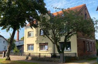 Mehrfamilienhaus kaufen in 19249 Lübtheen, Lübtheen - Mehrfamilienhaus mit großer Halle , Garten und 4 Garagen
