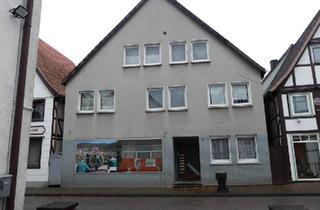 Haus kaufen in 32676 Lügde, Lügde - Haus in Lügde Stadtmitte von 1969 mit 5 Wohnungen zu verkaufen