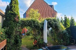 Wohnung kaufen in 40764 Langenfeld, Langenfeld (Rheinland) - Gartenwohnung mit Sauna