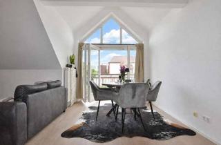 Wohnung kaufen in 88447 Warthausen, Helle Dachgeschosswohnung mit Tiefgarage in attraktiver Lage von Warthausen