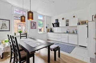 Wohnung kaufen in 67466 Lambrecht, Neustadt-Nähe - vermietete Wohnung mit Balkon und Gartenanteil, 2 x Stellplatz