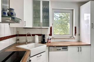Wohnung kaufen in 61250 Usingen, Gepflegte 3-Zimmer-Eigentumswohnung mit Balkon, Garage und Stellplatz in Usingen