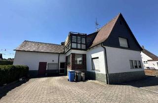 Einfamilienhaus kaufen in 63811 Stockstadt, Großzügiges Einfamilienhaus mit 949 m² Grundstück, Wintergarten, Doppelgarage & viel Potenzial