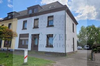 Haus kaufen in 47551 Bedburg-Hau, *Kapitalanlage* Dreifamilienhaus inkl. Anbau und Doppelgarage in Bedburg Hau!