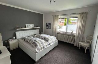Wohnung kaufen in 28844 Weyhe, Wohnen wie im eigenen Haus – 125 m² Erdgeschosswohnung mit Garten, Terrasse & Garage