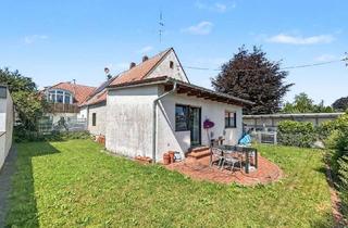 Wohnung kaufen in 82110 Germering, Familiengerechte 4-Zimmer-Erdgeschoss-Wohnung mit ca. 300 m² Gartenanteil in Germering