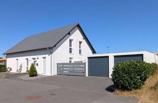 Haus kaufen in 56826 Wollmerath, Modernes Familienhaus mit Einliegerwohnung, großem Grundstück und Energieeffizienz A+