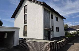 Mehrfamilienhaus kaufen in Schillerstr., 61206 Wöllstadt, Mehrfamilienhaus mit großem Grundstück in Nieder-Wöllstadt