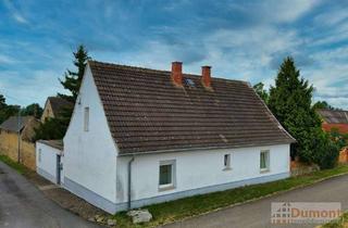 Einfamilienhaus kaufen in 06246 Milzau, Freistehendes Einfamilienhaus mit vielseitiger Raumaufteilung und gemütlichem Innenhof.