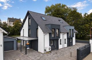 Doppelhaushälfte kaufen in 66914 Waldmohr, Doppelhaushälfte von 2021 mit Wärmepumpe, Garage und Garten