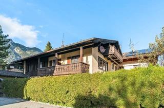 Wohnung kaufen in 82467 Garmisch-Partenkirchen, Vermietete 3-Zimmer-Wohnung mit Zugspitzblick in Garmisch mit Doppel-Garage