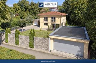 Einfamilienhaus kaufen in 88400 Biberach, Stilvolles Einfamilienhaus in mediteranem Stil mit großzügigem Grundstück 3 Garagen und Carport