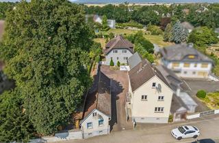 Haus kaufen in 61206 Wöllstadt, Vielseitiges Dreier- Ensemble im Herzen von Nieder-Wöllstadt