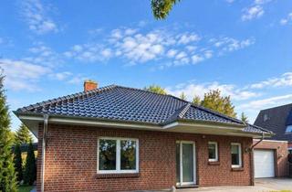 Haus kaufen in 26529 Osteel, Modernes Wohnen auf einer Ebene! Komfortabler Bungalow mit großer Garage in Osteel.