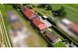 Haus kaufen in 26826 Weener, Attraktive Doppelimmobilie – Eigennutzung und Vermietung ideal kombinierbar
