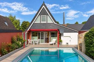 Haus kaufen in 27476 Cuxhaven, Seltene Gelegenheit in Duhnen – Nurdachhaus auf 541 m² mit Pool, Sauna & Garage