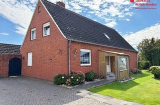 Einfamilienhaus kaufen in 26624 Südbrookmerland, Großzügiges Einfamilienhaus mit flexiblem Wohnkonzept in ruhiger Feldrandlage von Moordorf