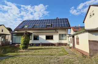 Haus kaufen in 68642 Bürstadt, Zweifamilienhaus mit großem Garten, viel Platz und Photovoltaikanlage
