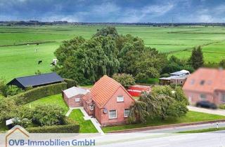 Einfamilienhaus kaufen in 26802 Moormerland, Sanierungsbedürftiges Einfamilienhaus direkt an der Ems in Moormerland-Terborg