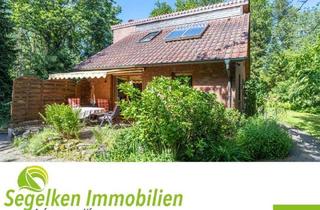 Haus kaufen in 27243 Kirchseelte, Interessant gebautes und idyllisch gelegenes Haus mit 33,12 m² großem Dachstudio , Garage und Gar...