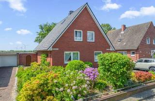 Einfamilienhaus kaufen in 25813 Husum, Blick ins Grüne, zentrumsnah und sofort verfügbar: Einfamilienhaus mit Garten und Garage in Husum.
