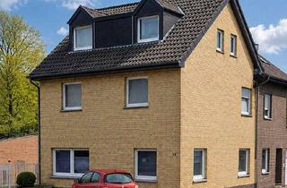 Haus kaufen in 47623 Kevelaer, Attraktive Kapitalanlage mit drei Wohneinheiten und zusätzlicher Gewerbeeinheit