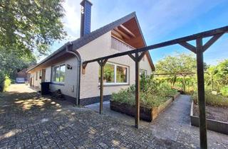 Einfamilienhaus kaufen in 26831 Bunde, Wohnen und vermieten - Einfamilienhaus mit Einliegerwohnung