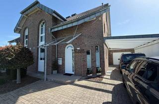Doppelhaushälfte kaufen in 41844 Wegberg, Rundum sorglos: Gepflegte Doppelhaushälfte mit Pool, Saunabereich und stilvollem Mehrzweckgartenhaus