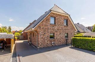 Haus kaufen in 25436 Uetersen, Stilvolles Wohnen: Modernes KfW55-Haus mit Südterrasse und kleinem Garten