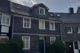 Haus kaufen in 42553 Velbert, Historisches Wohn- und Geschäftshaus am Kirchplatz in Velbert-Neviges zu verkaufen
