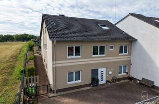 Einfamilienhaus kaufen in 55234 Erbes-Büdesheim, Großzügiges Einfamilienhaus in Feldrandlage von Erbes-Büdesheim – Garten und neu ausgebautes DG