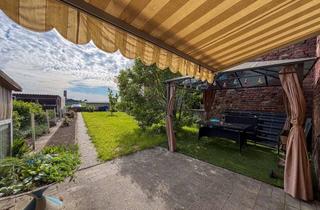 Reihenhaus kaufen in 52525 Heinsberg, Charmantes Reihenhaus mit Charakter & Potenzial · Innenhof, Terrasse, Garten & 2 Garagen