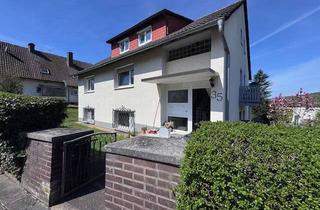 Haus kaufen in 36396 Steinau, Dreifamilienhaus als attraktive Kapitalanlage mit 5 Garagen und großem Grundstück
