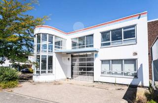 Gewerbeimmobilie kaufen in 53844 Troisdorf, Flexibel nutzbare Gewerbeimmobilie mit zwei Wohneinheiten.