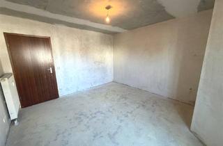 Wohnung kaufen in 91074 Herzogenaurach, Entkernt & bereit für neue Ideen – 2-Zimmer-Wohnung mit Terrasse und TG-Stellplatz in Herzogenaurach