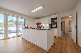 Penthouse kaufen in 64569 Nauheim, Modernes Wohnen auf höchstem Niveau – Penthouse mit 38 m² Terrasse und zwei TG-Stellplätzen