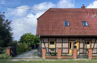 Doppelhaushälfte kaufen in 15370 Petershagen, Gepflegte Niedrigenergie Fachwerk-Doppelhaushälfte mit schneller Anbindung an Berlin